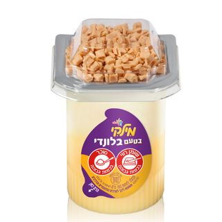 מעדן חלב עם שוקולד לבן בטעם קרמל, ותוסף בטעם קרמל